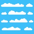 Clouds icon set. Different cloud shapes isolated on the blue sky background. Vector illustration. Royalty Free Stock Photo
